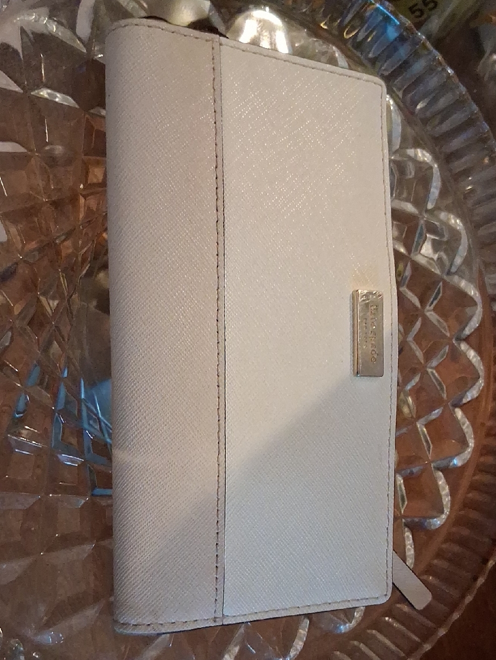 kate spade Cream Saffiano Leather Zip Wallet with Silver Plaque